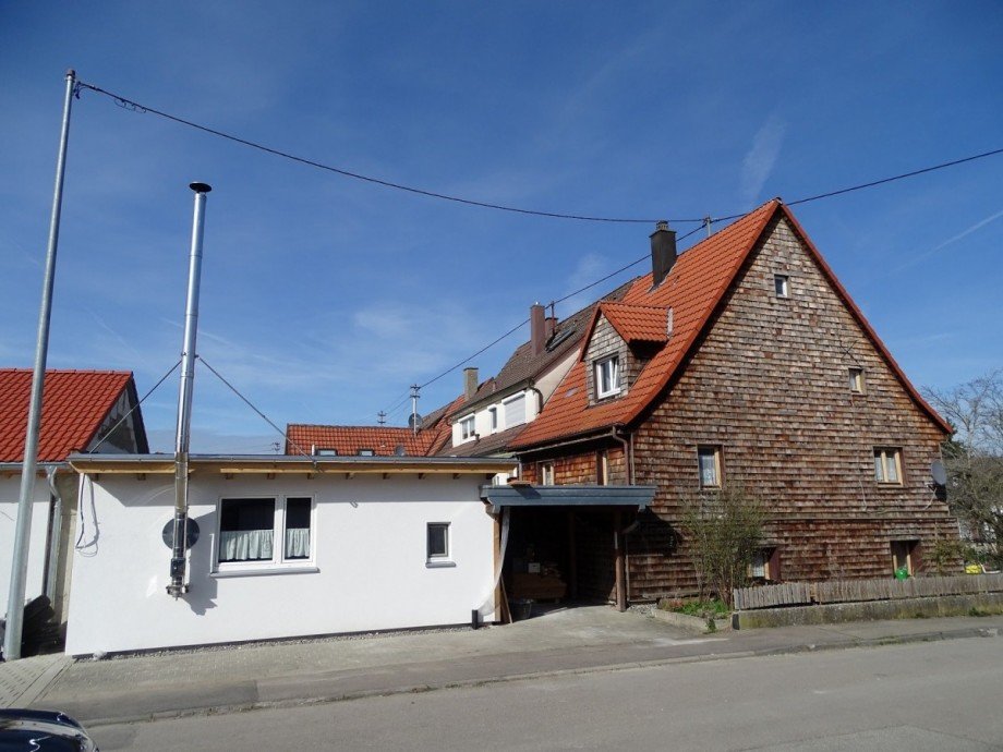 Seitenansicht mit Anbau Einfamilienhaus Tuningen